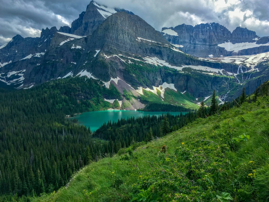 The epic scenery on the Grinnell Glacier Hike. This is a must for anyone on their Glacier National Park to Yellowstone trip. 