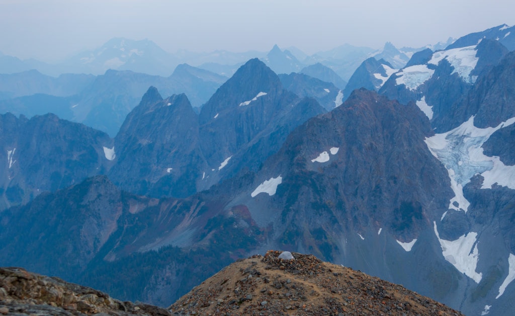 One of the best North Cascades backpacking locations Sahale Glacier Camp offers 10/10 views of the mountains. 