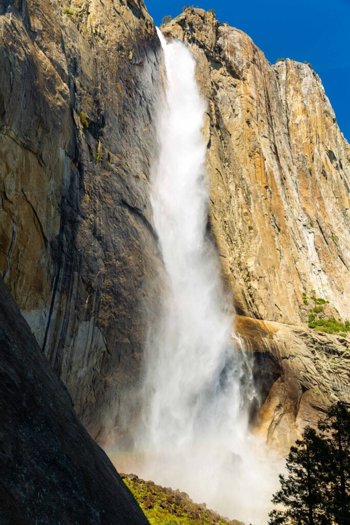 looking up at upper yosemite falls from the trail
