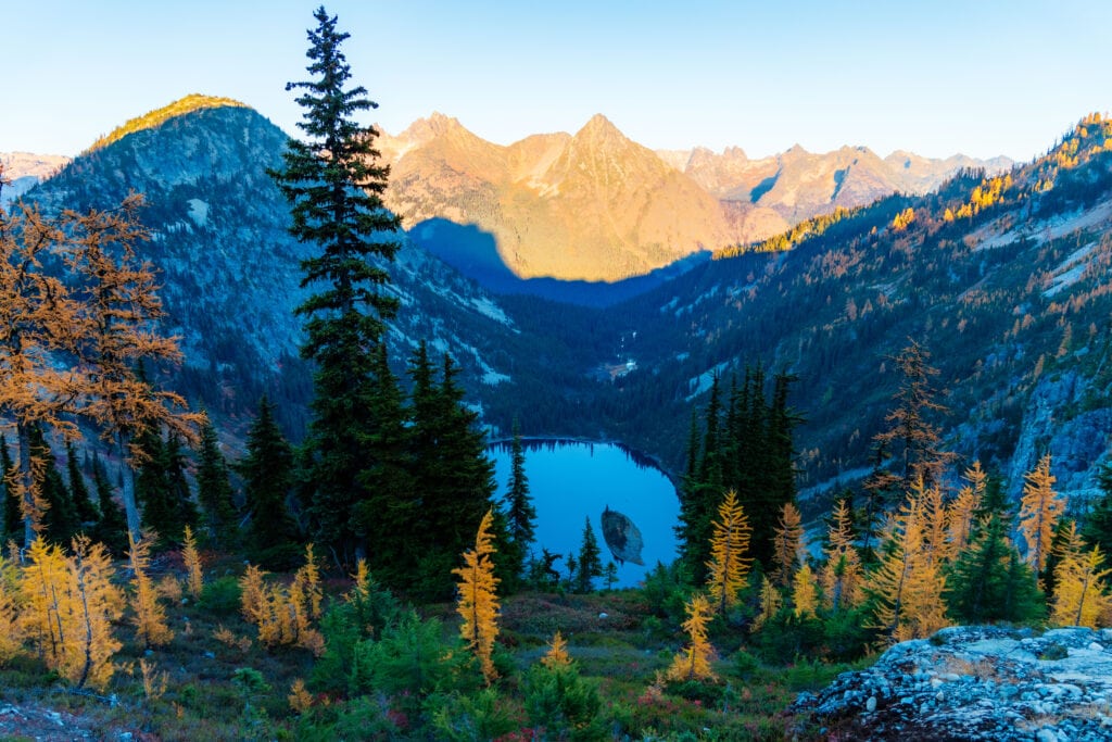 View of the mountains and lake from the ridgeline. 