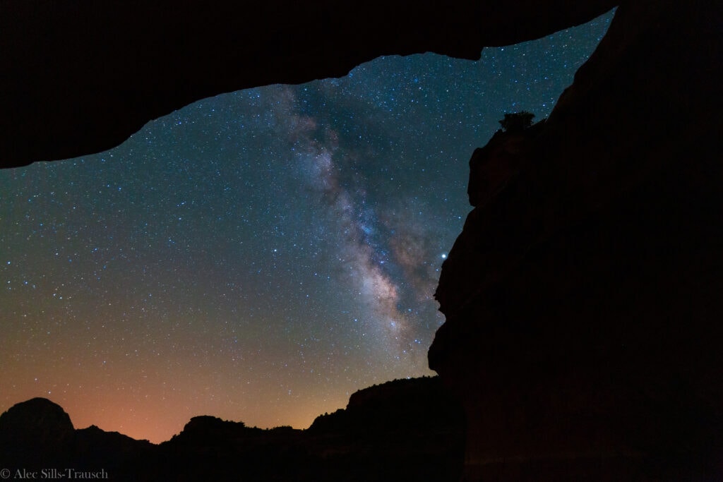 A photo of the milky way from inside one of the caves. It's nearly vertical in the night sky. 