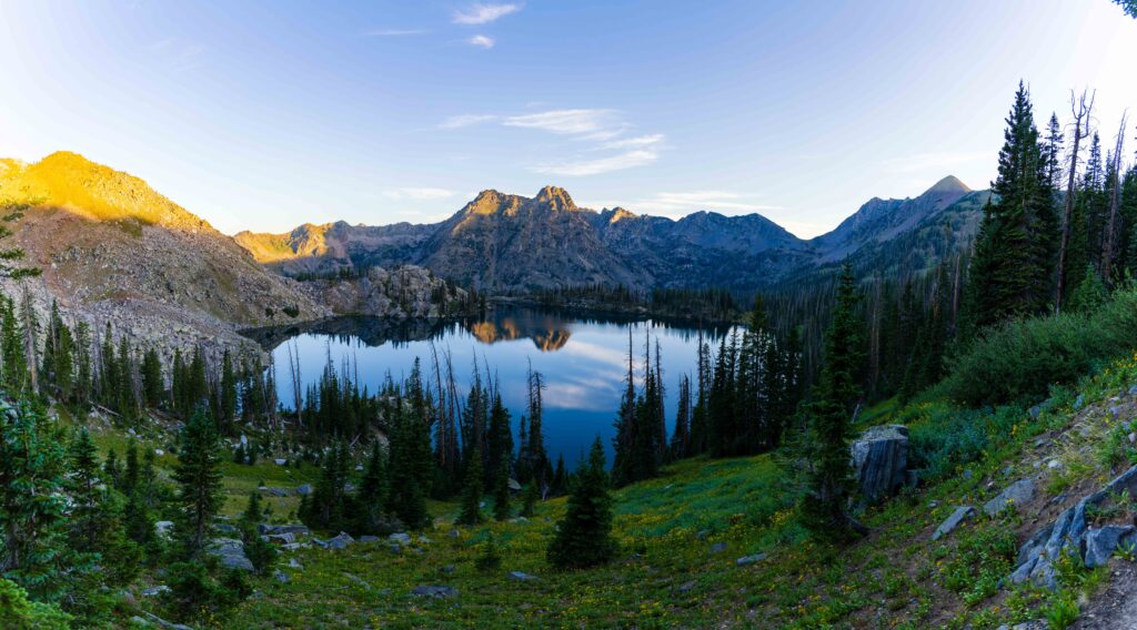 the entire gilpin lake basin with mountains and trees