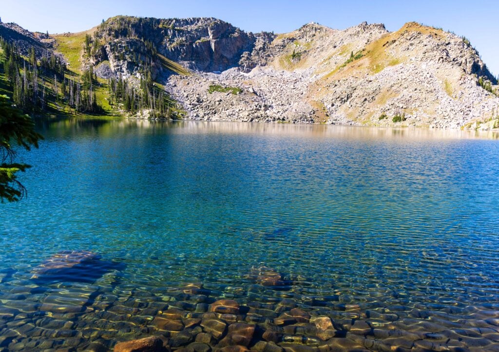 the clear blue color of gilpin lake in the morning