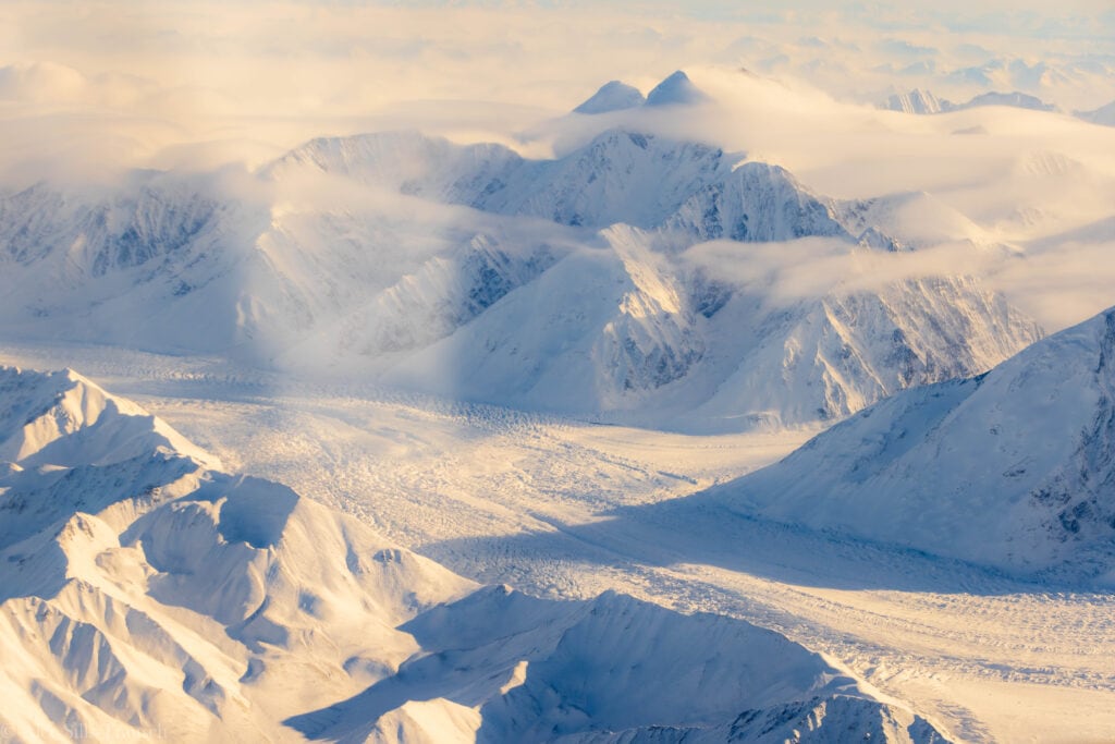 jagged peaks and snowy glaciers taken from the sky