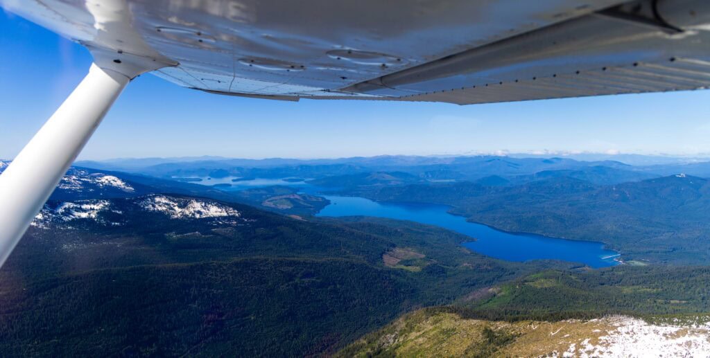 priest lake on the distance seen from a flightseeing tour