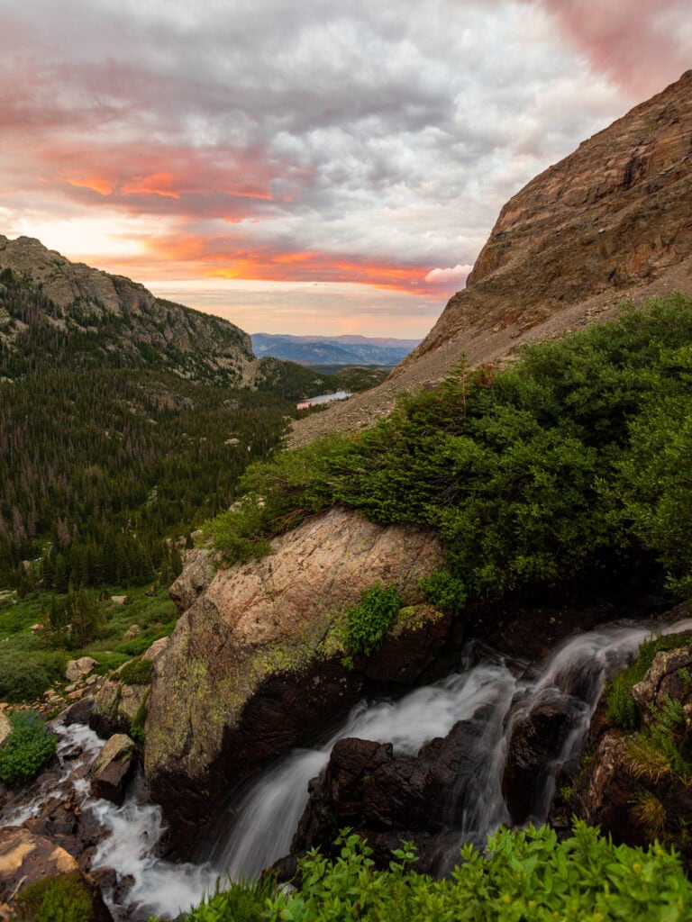 a gorgeous sunset over timberline falls in the colorado rockies