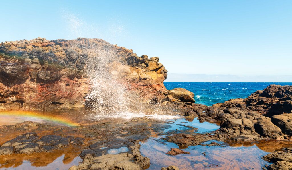 the nakalele blow hole on maui shooting water into the air 