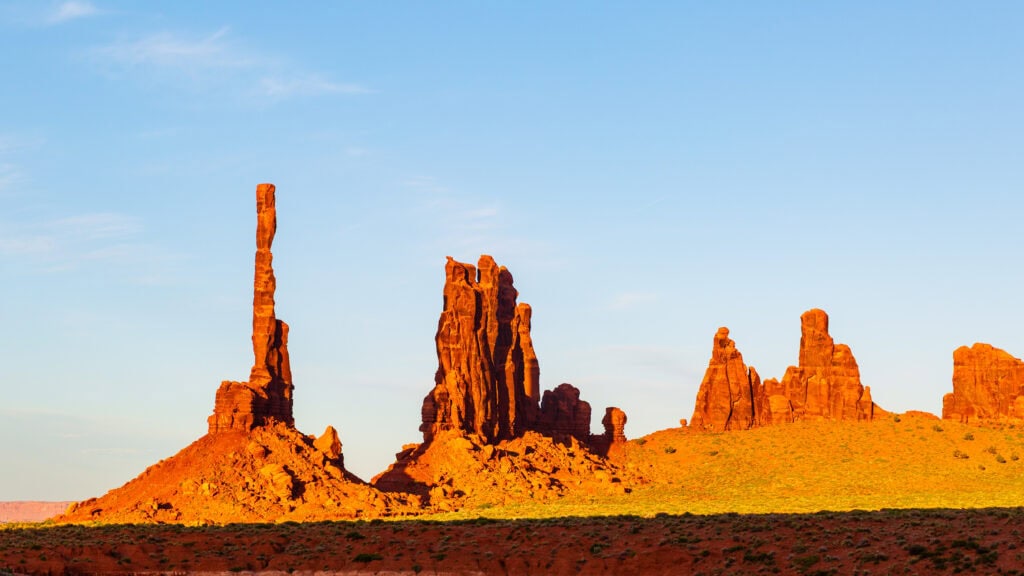 sunset in the monument valley backcountry looking at spires and red rocks
