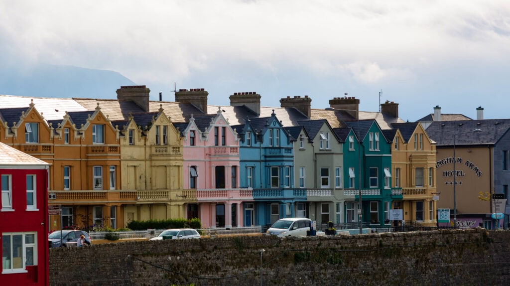 multi colored house along the irish coastline's wild atlantic way