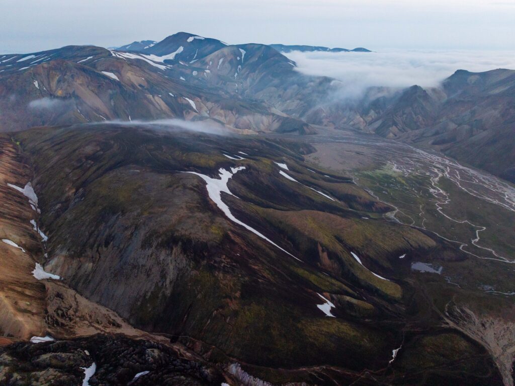 views of landmannalaguar from ave with snowy mountains and winding rivers