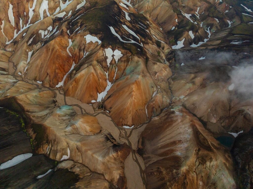 stunning colors of the icelandic highlands from the sky