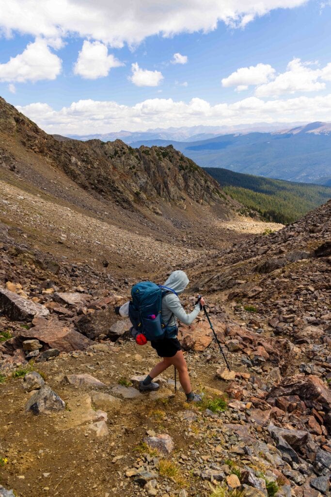 a hiker heading down from fancy pass
