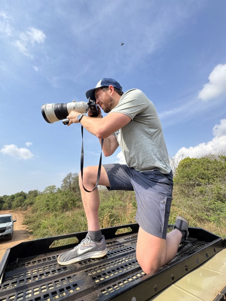 The author taking a photo on his knee with the 400mm prime lens