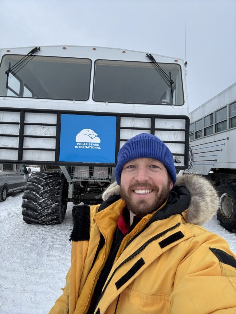 selfie in front of the new EV Tundra Buggy