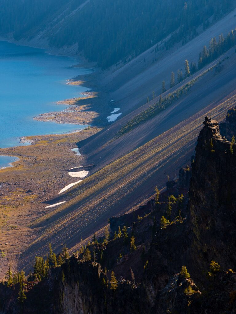 looking down at the rocky slopes of crater lake