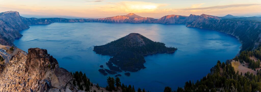 colorful skies above crater lake as the sun sets