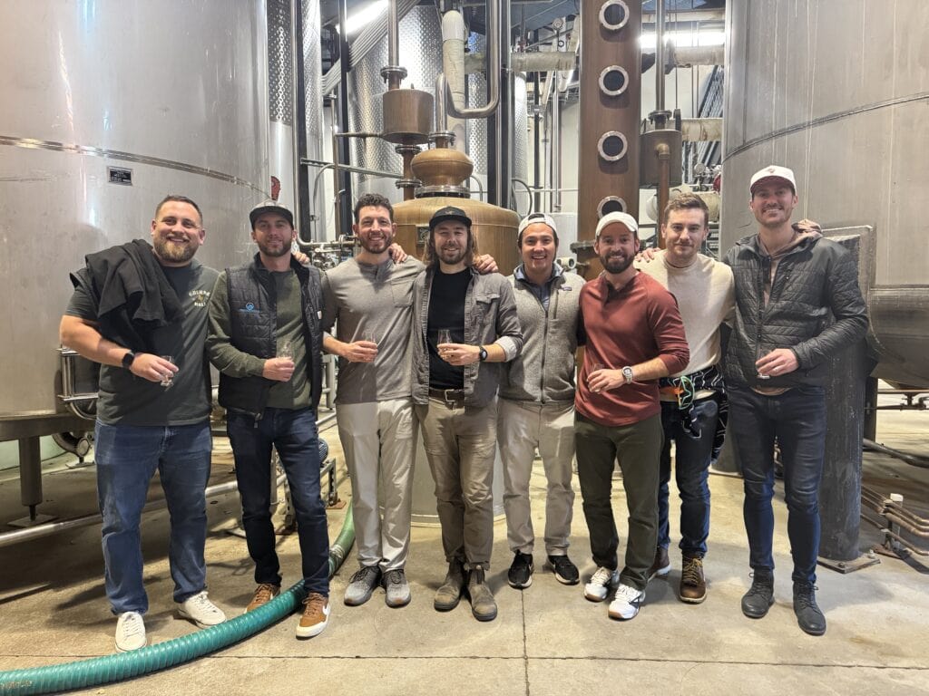 a group of guys at the Breckenridge distillery tour