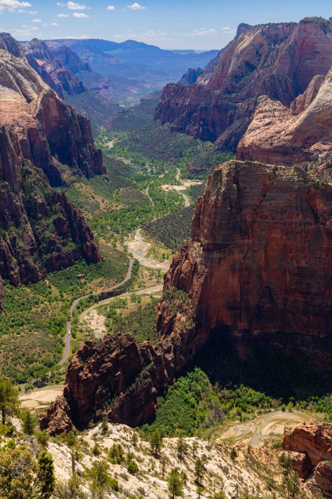a view of zion canyon, angels landing, and the canyon road below observation point