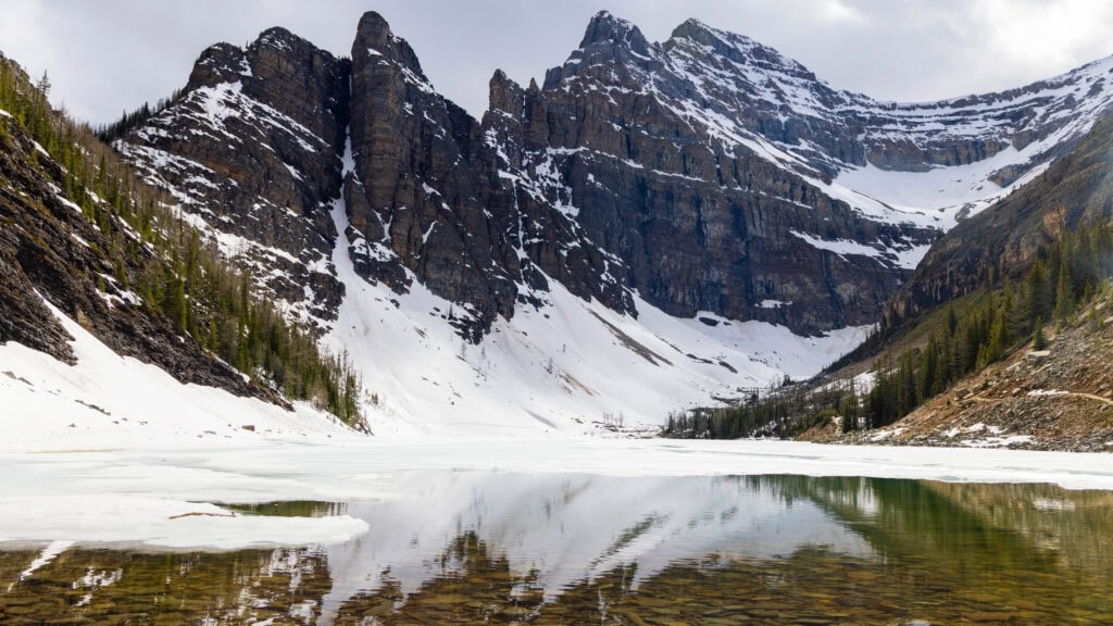 the reflection off lake agnes in canada