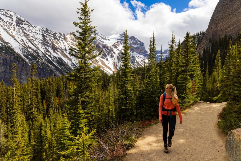 a female hiker on the little beehive and lake agnes trail in banff