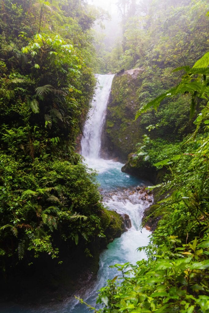 la pintada waterfall surrounded by green landscapes