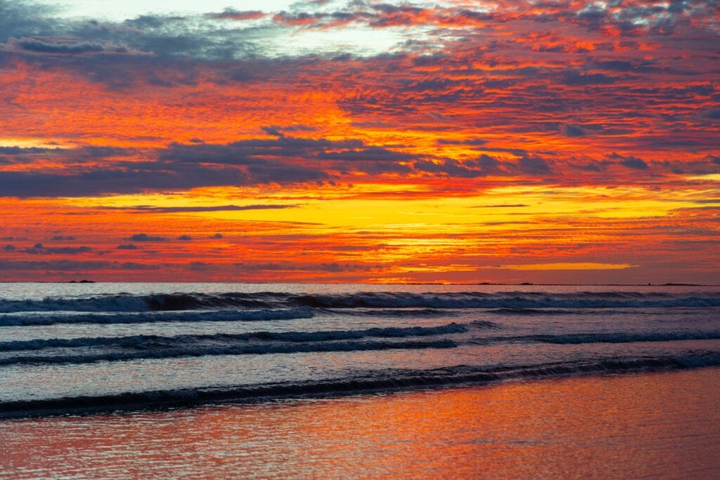 stunning sunset colors next to the ocean in uvita