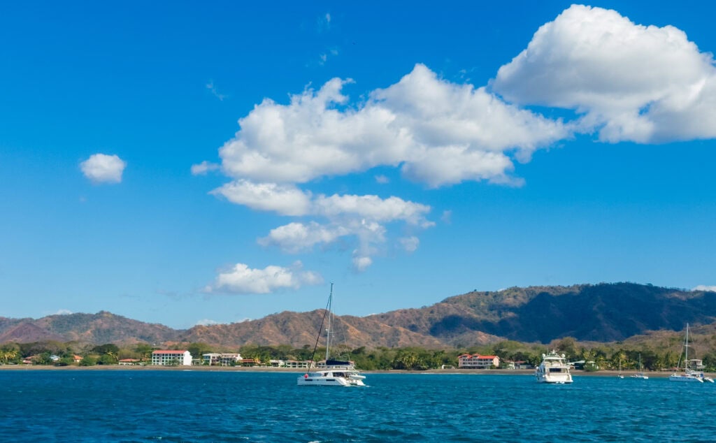 boats in the bay off the shore of Guanacaste costa rica