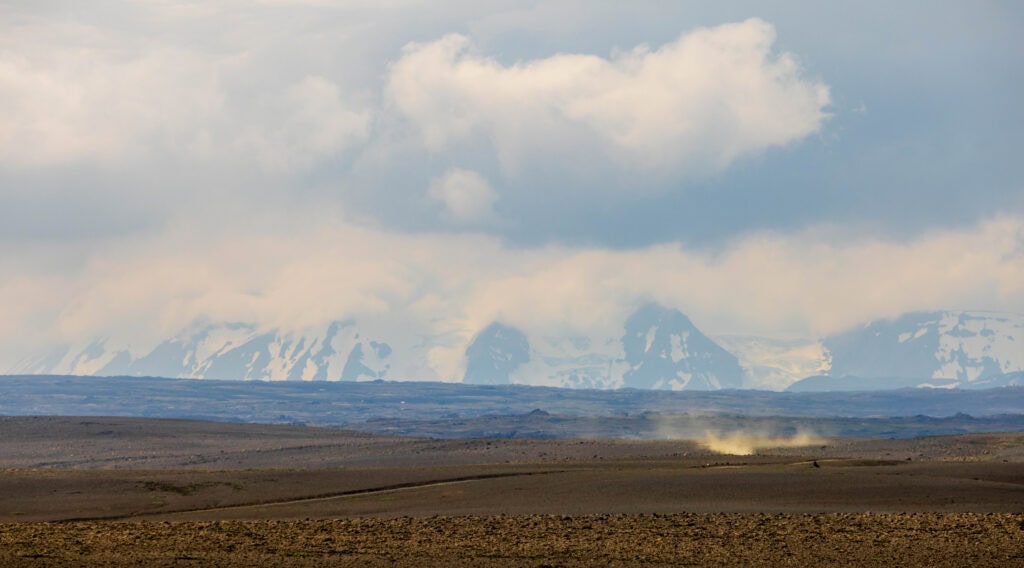 large mountains with snow on top a seen from the f35 road in iceland