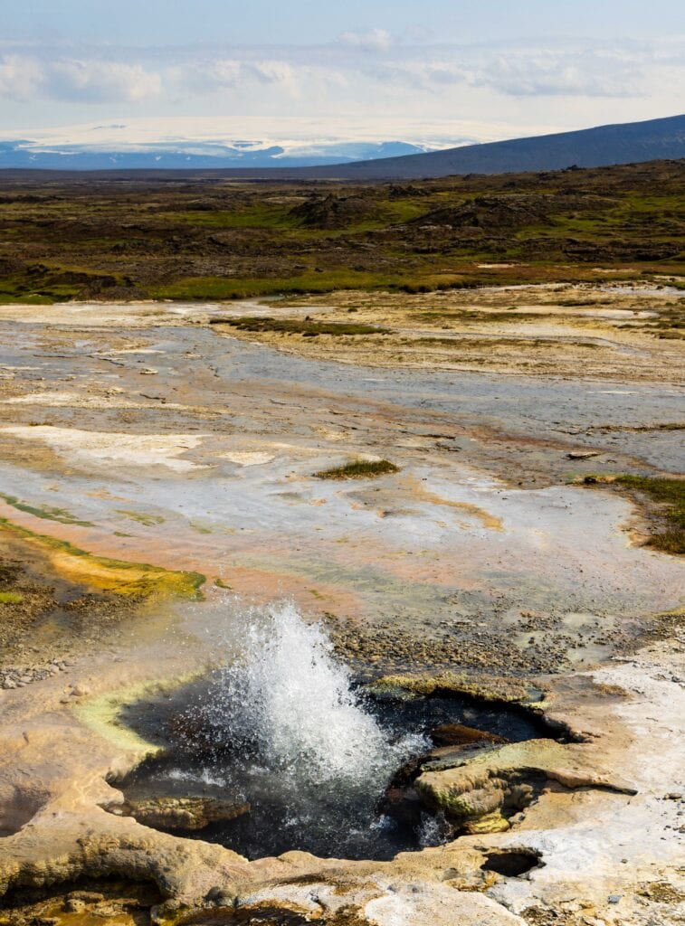 Hveravellir geothermal area in the middle of iceland near the f35 road - a small geysir pops up