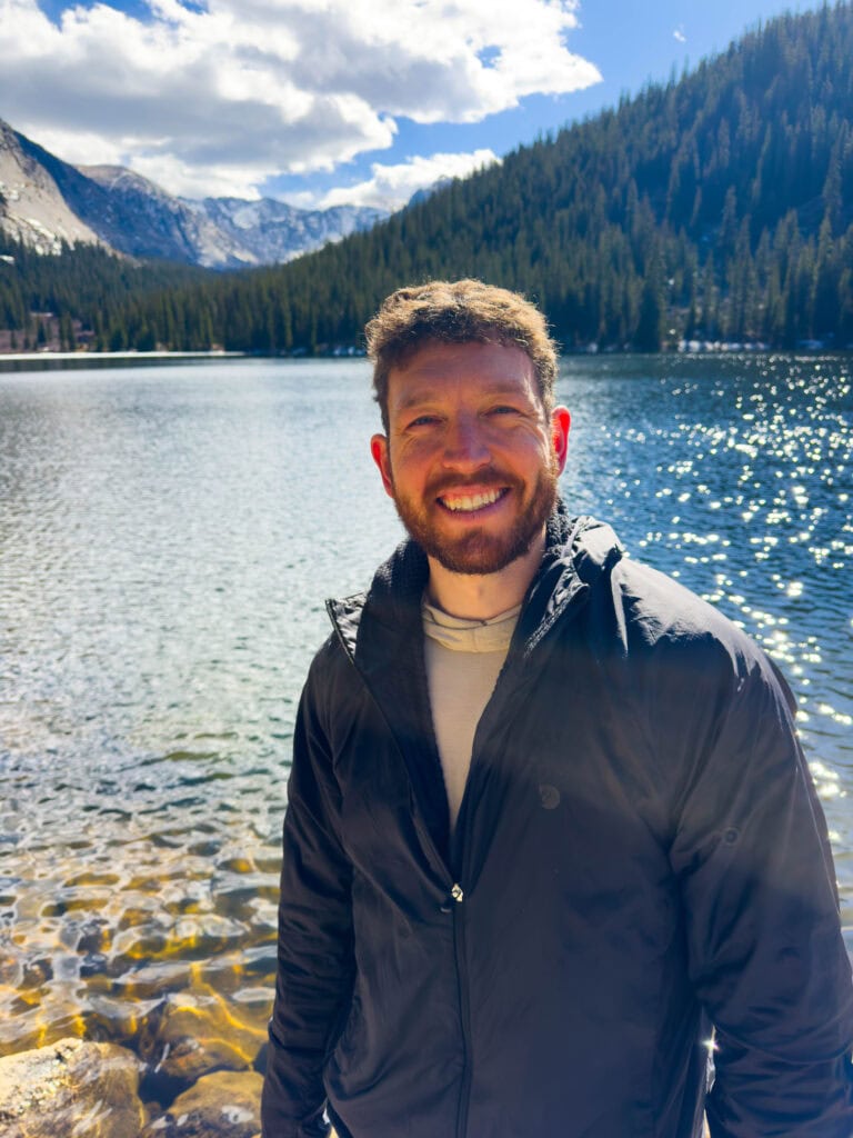 the author smiling at the camera at idaho springs reservoir