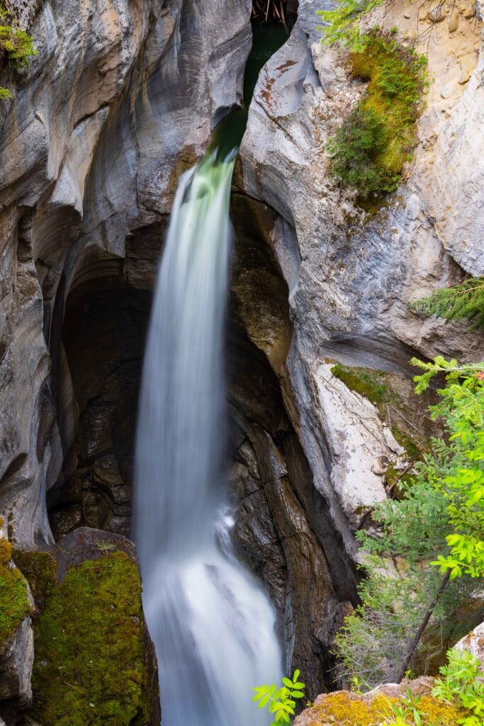 a long exposure waterfall at maligne canyon, part of the jasper itinerary