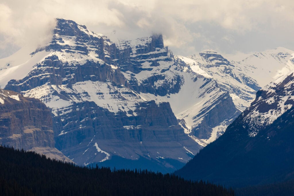 towering snowcapped mountains in jasper national park