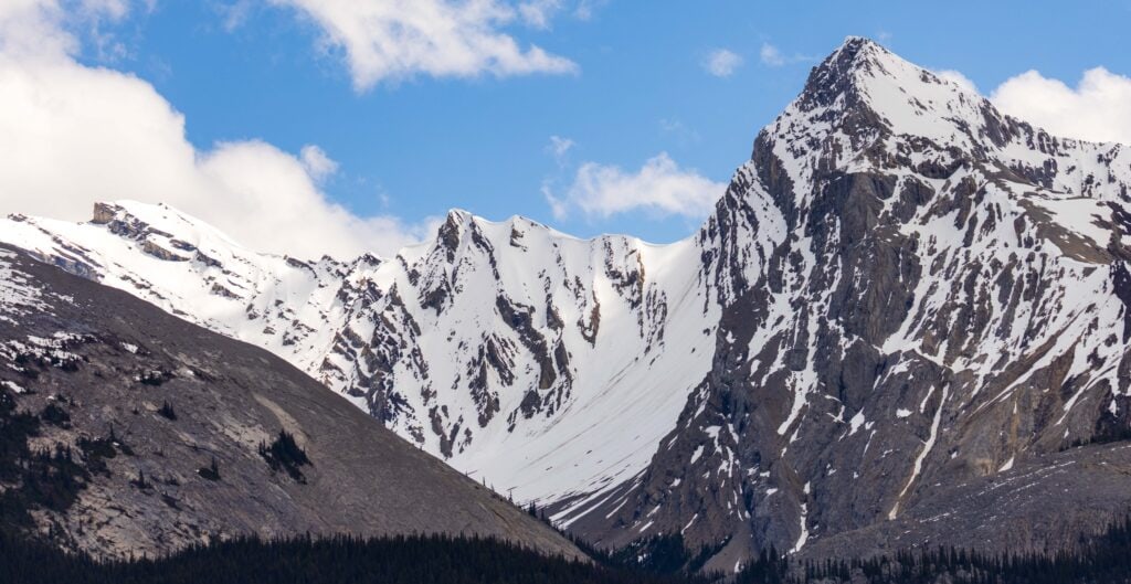 towering snowcapped mountains in jasper national park