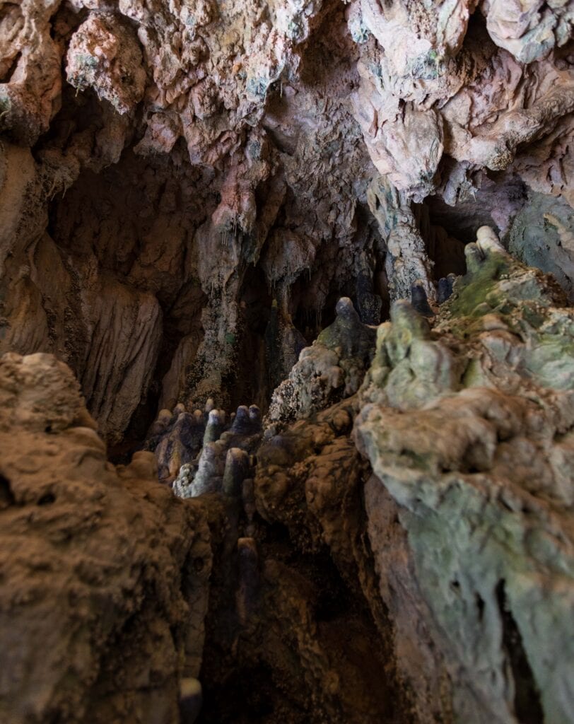 Rocky cave entrance with stalactite formations at Westcave Outdoor Discovery Center in Texas Hill Country
