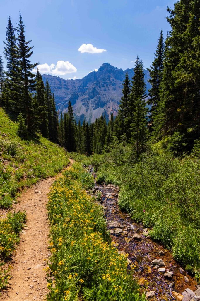 a trail in the middle of the image, on the four pass loop in colorado
