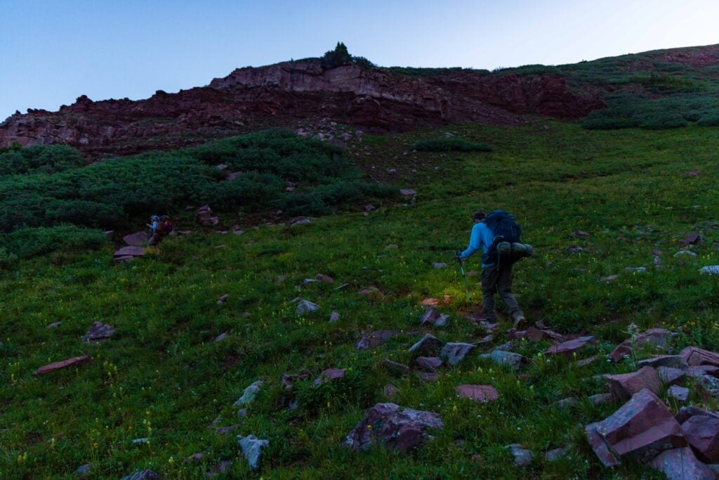 two hikers on the trail in the early morning dawn