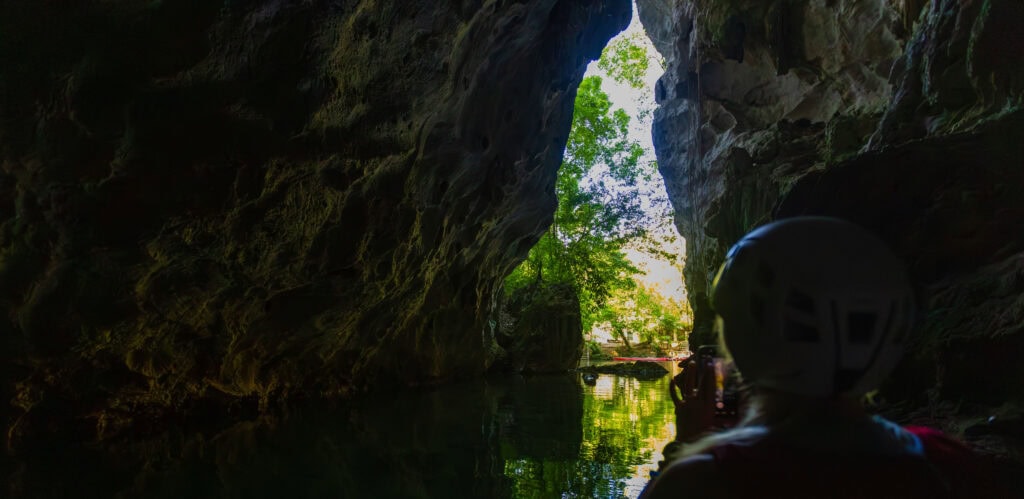 the entrance/exit of the barton creek cave in belize