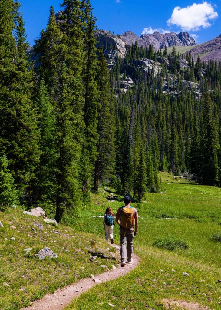 two hikers on the gore lake trail in colorado