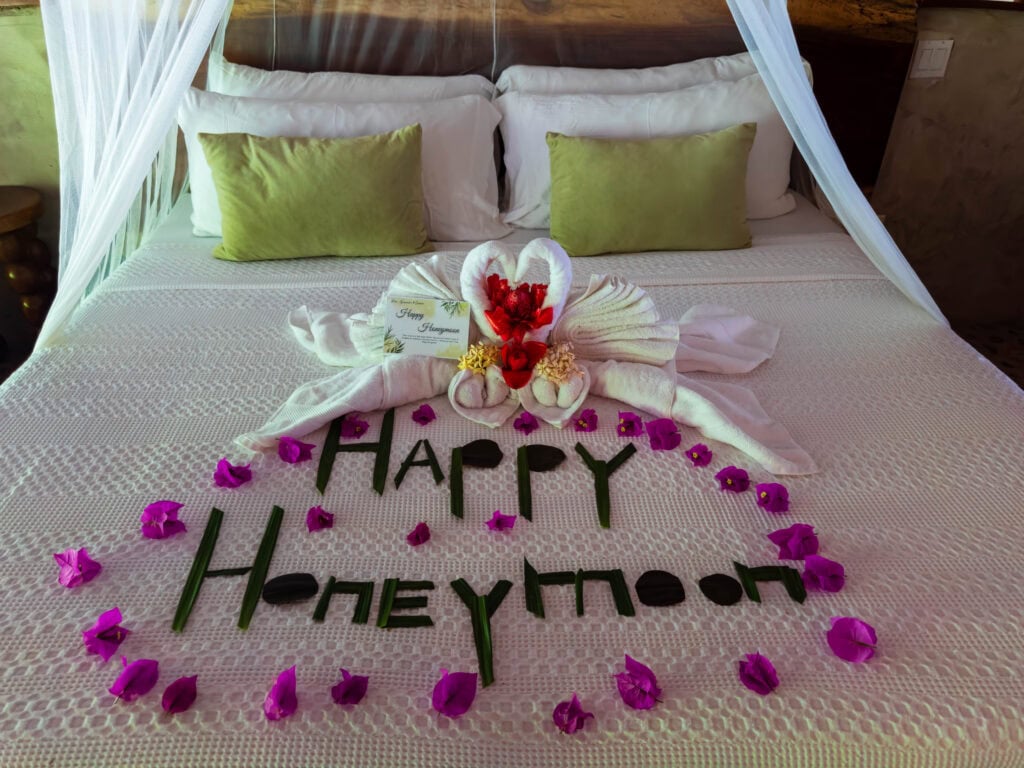 bed with happy honeymoon on it