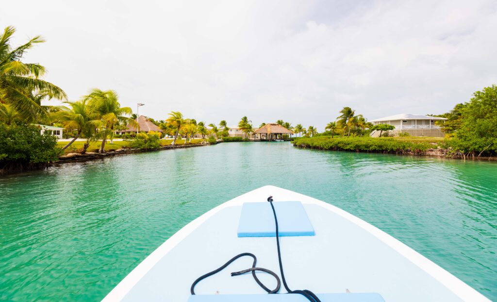 the front of a boat as it enters a channel
