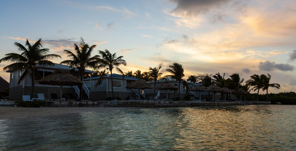 a sunset image of shaka caye resort in belzie