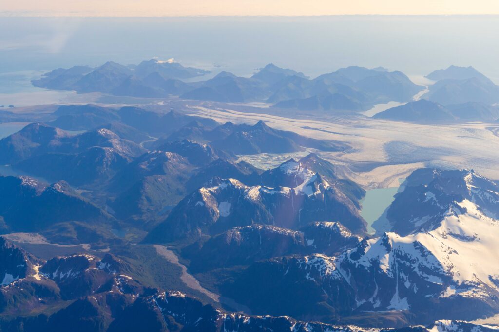 flying over mountains and glaciers