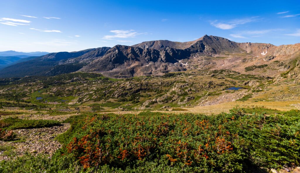 small lakes with mountains in the distance