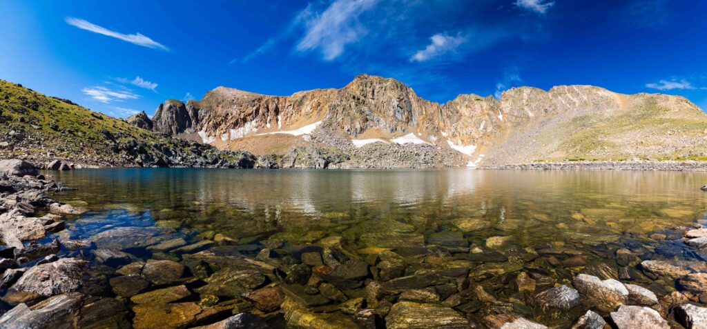 panorama of lake Dorothy with a reflection of mountains
