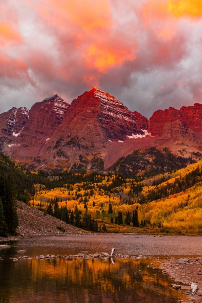 morning light hitting maroon bells in aspen colorado during fall