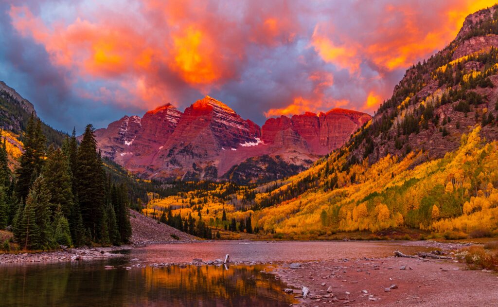 morning light hitting maroon bells in aspen colorado during fall