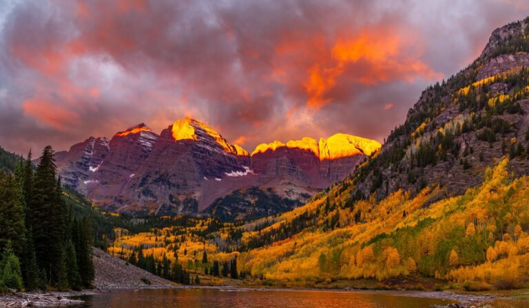 morning light hitting maroon bells in aspen colorado during fall