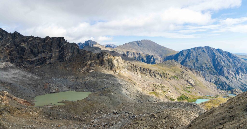 turquoise lakes in the basin far below