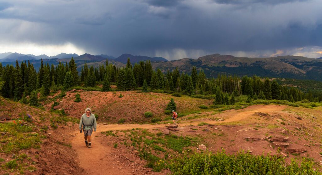 two hikers on the shrine ridge trail in colorado