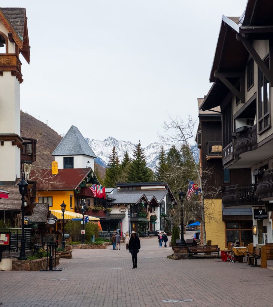a person walks through the shops in vail